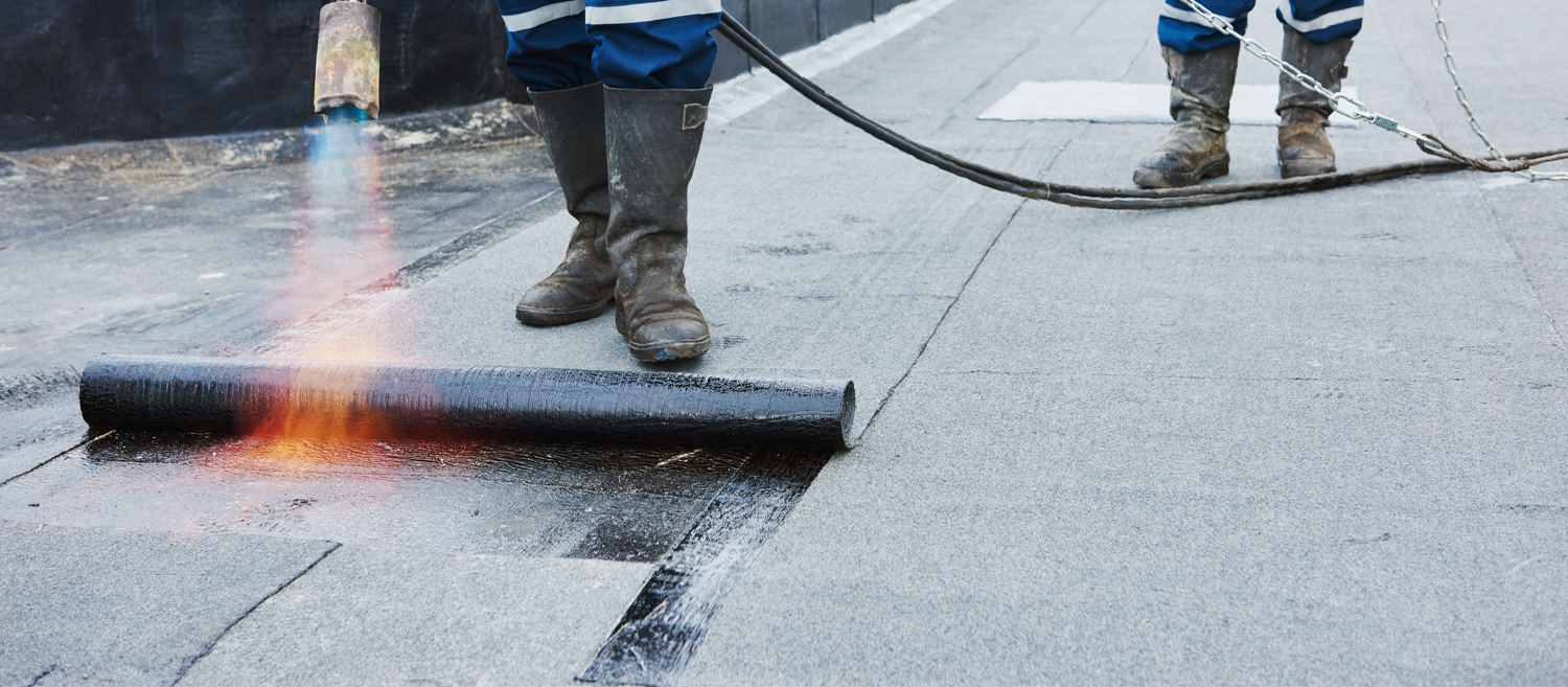 hot tar roof on commercial building